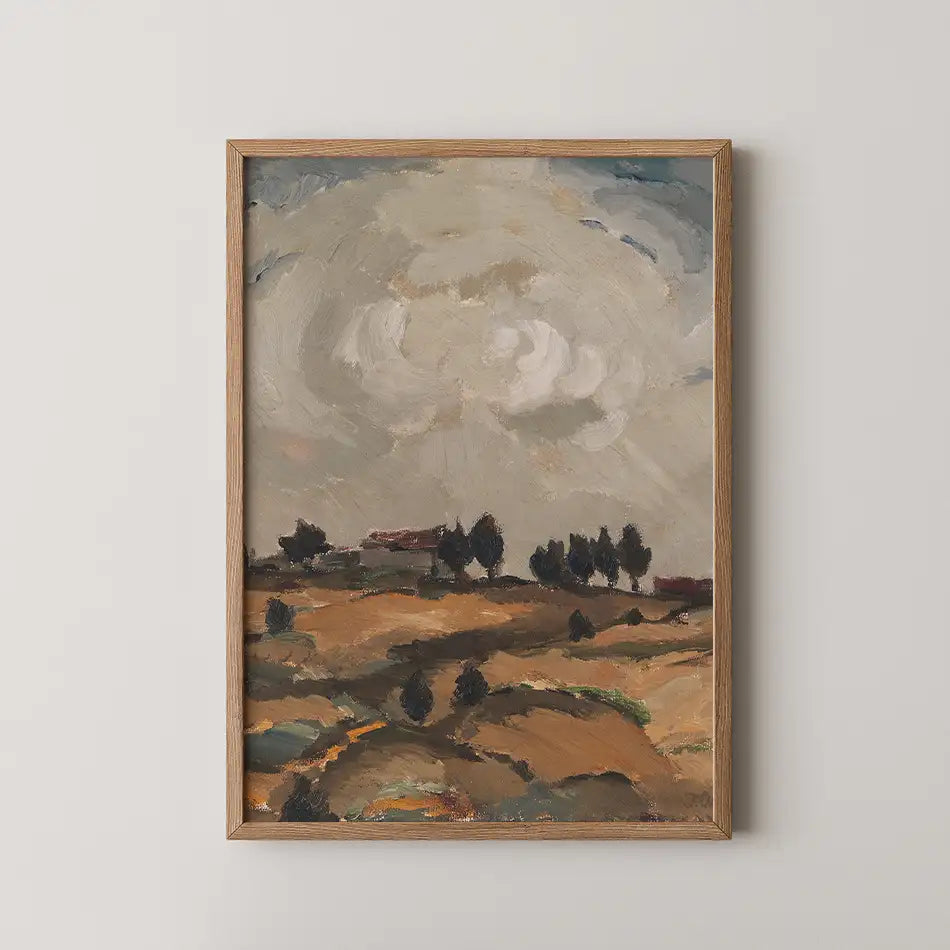 Landscape painting with a cloudy sky, framed in wood, featuring rolling hills and distant trees.
