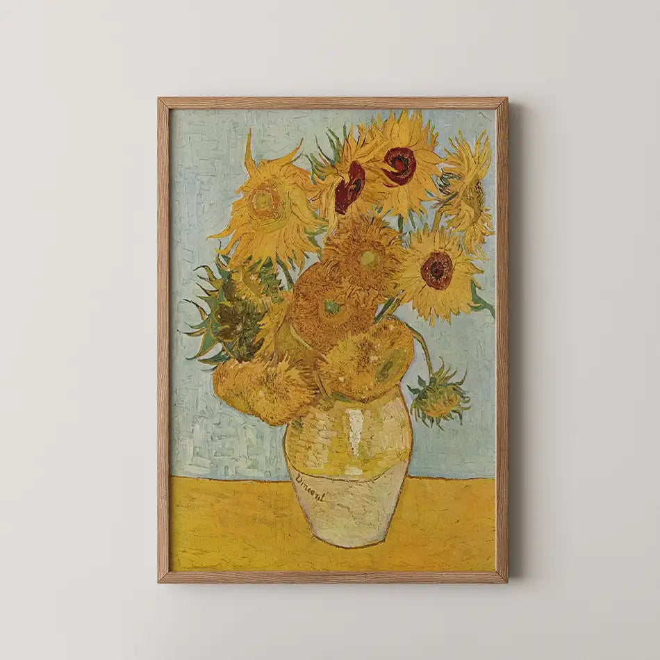 Sunflower painting in a wooden frame, featuring vibrant yellow sunflowers in a vase against a textured light blue and yellow background.
