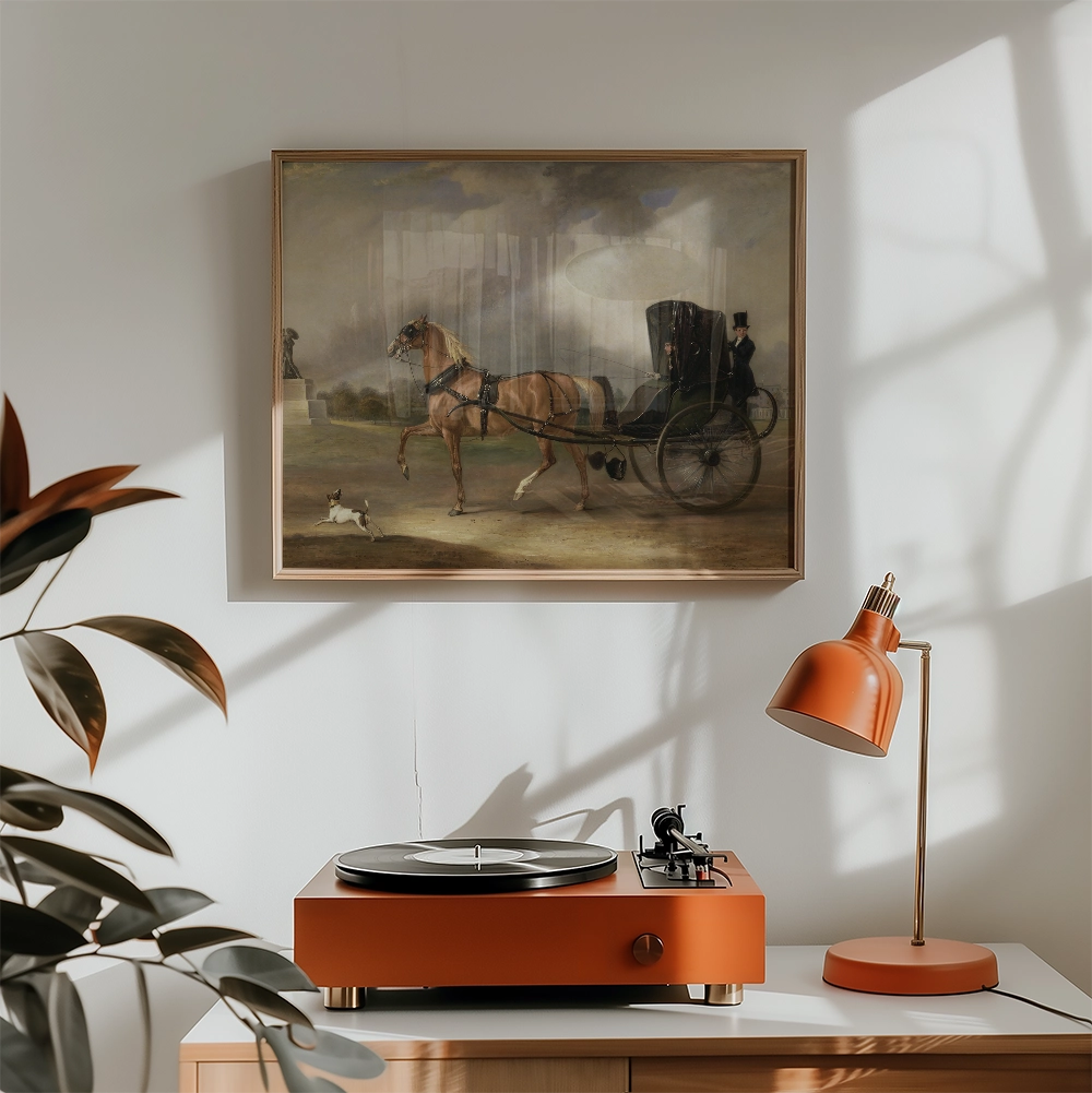 A vintage-style painting of a horse-drawn carriage with a figure and a dog, located above a modern orange record player and lamp in a sunlit room.