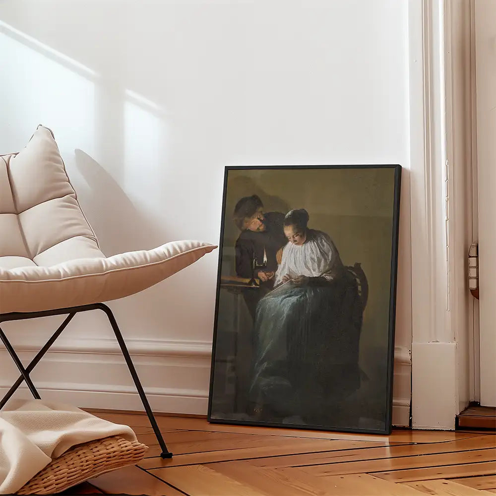Framed painting leaning against a wall beside a stylish chair in a cozy interior setting.
