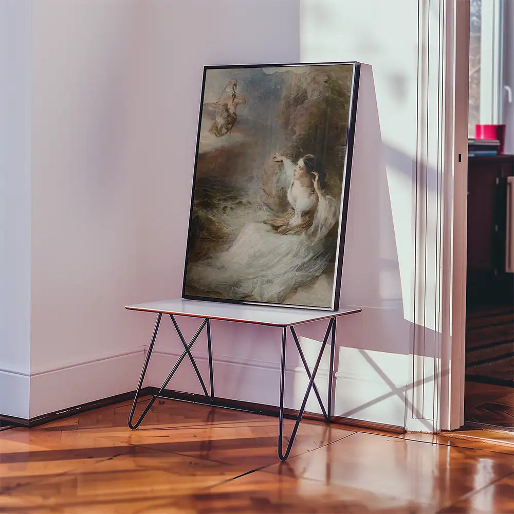 A large framed painting featuring a serene scene with figures by the water, displayed on a minimalist table in a well-lit room.