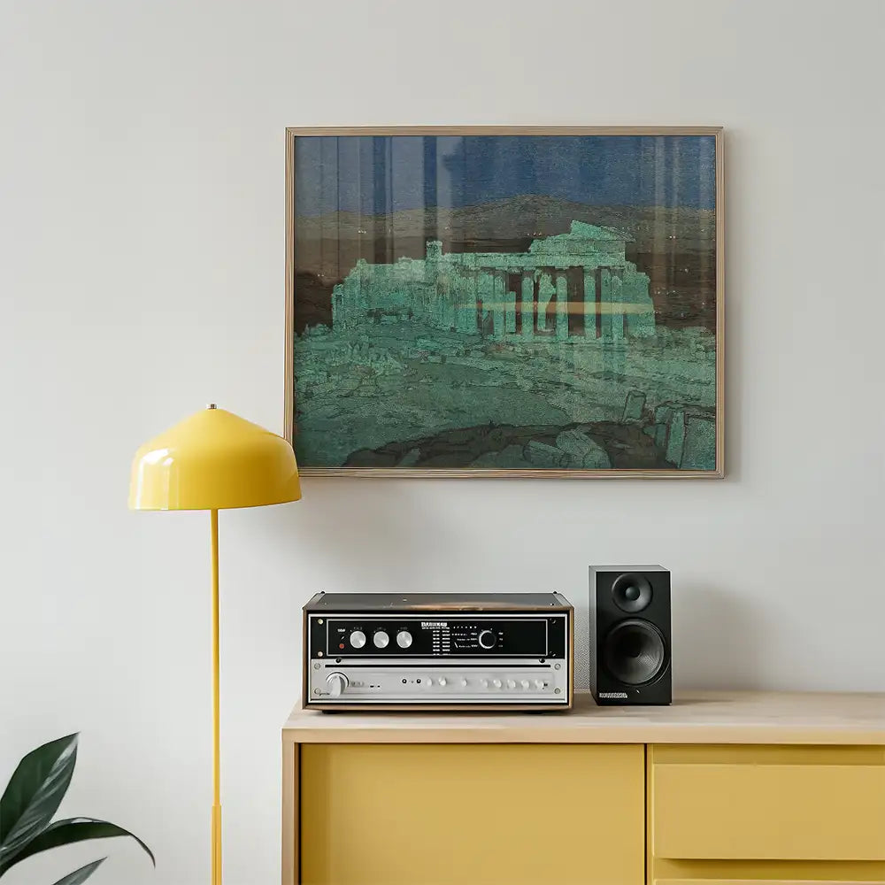 Framed painting of ancient ruins in muted colors hanging on a wall, with a yellow lamp, vintage sound system, and speakers on a wooden cabinet.