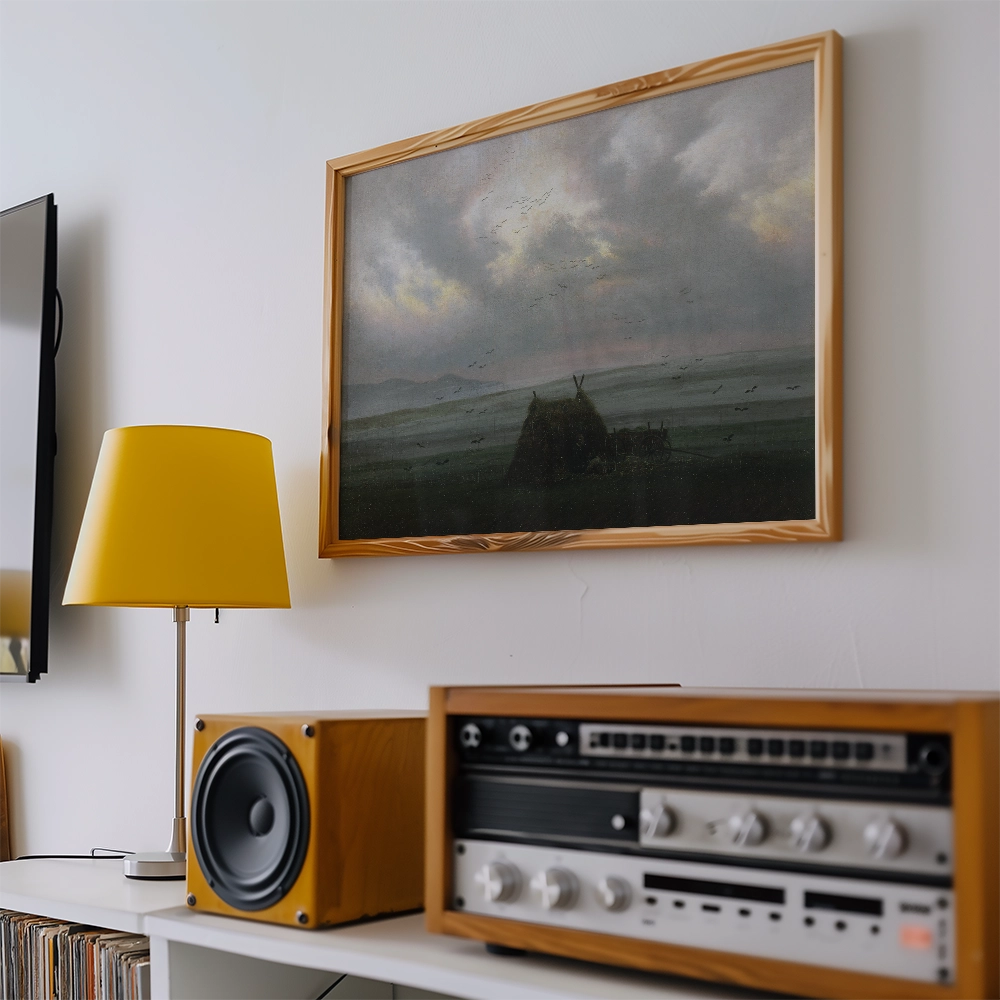 Vintage landscape painting in a wooden frame hanging on a wall, with a yellow lamp and audio equipment visible in the foreground.