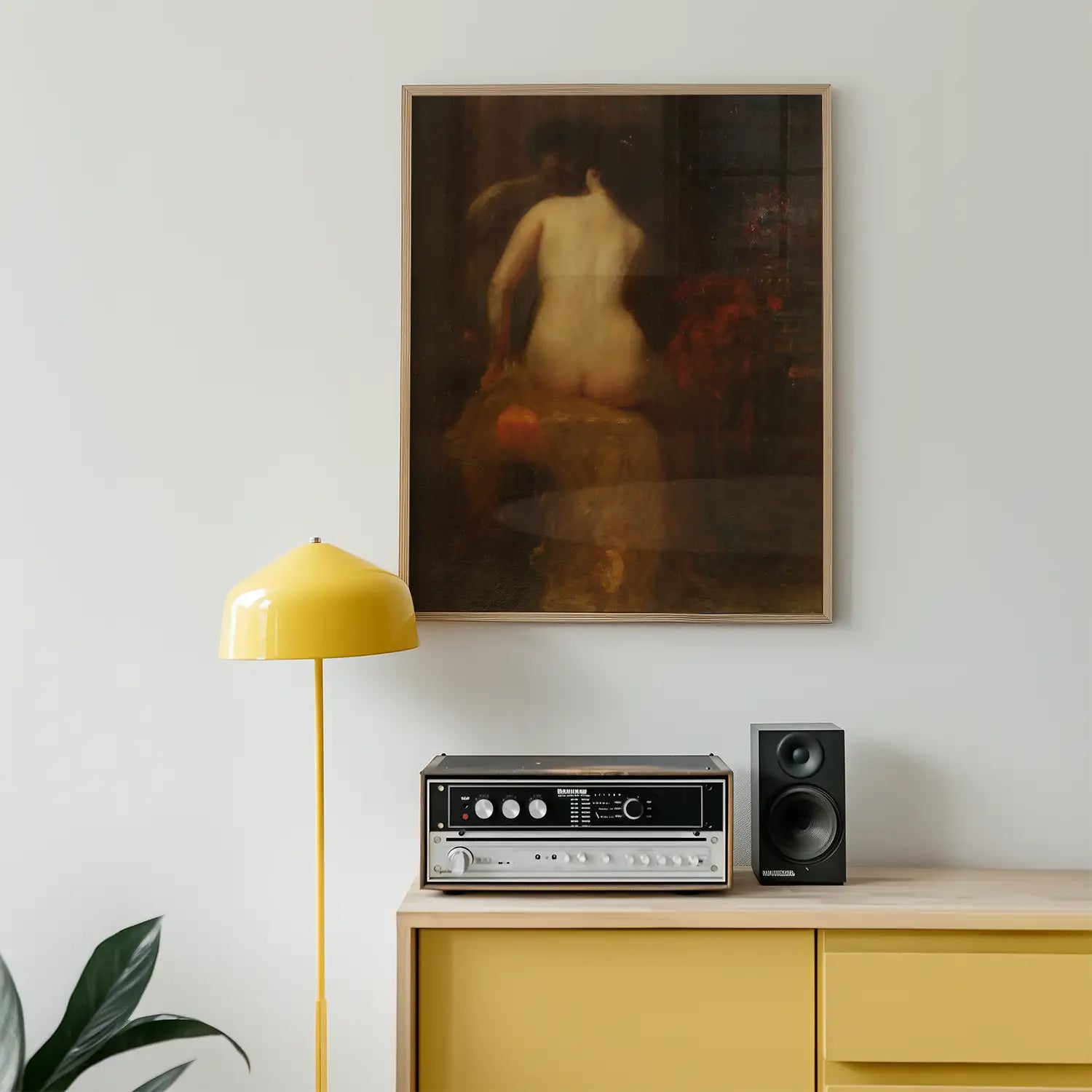 Artistic painting featuring a nude figure hanging on a wall above a vintage audio system and a yellow lamp in a modern interior setting.