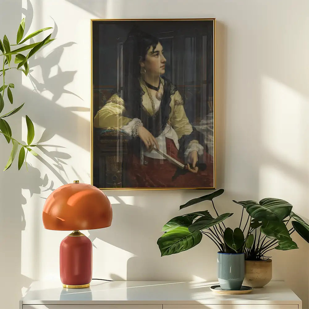 Portrait of a historical woman in elegant attire, framed and displayed on a wall, beside a modern lamp and potted plants.