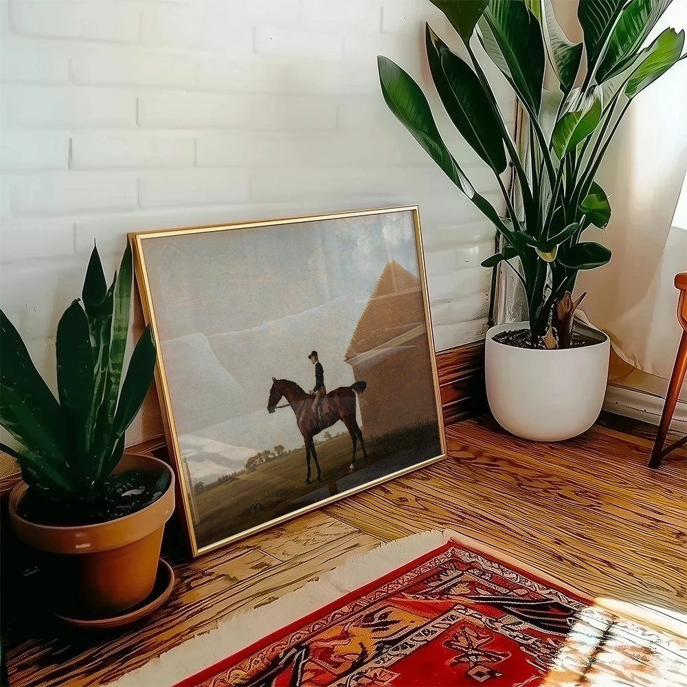 Framed painting of a person on a horse in a landscape, leaning against a wall with indoor plants and a colorful rug.