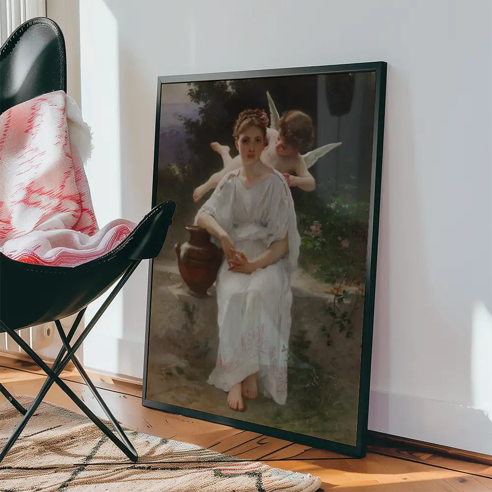 Painting of a woman in a white dress holding an urn, with a cherub sitting behind her, displayed next to a black chair and a cozy blanket.