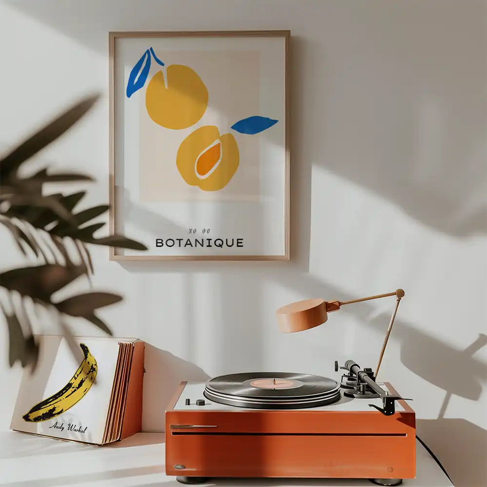 Modern botanical art print featuring two yellow fruit illustrations against a minimalist backdrop, ideal for contemporary home decor.