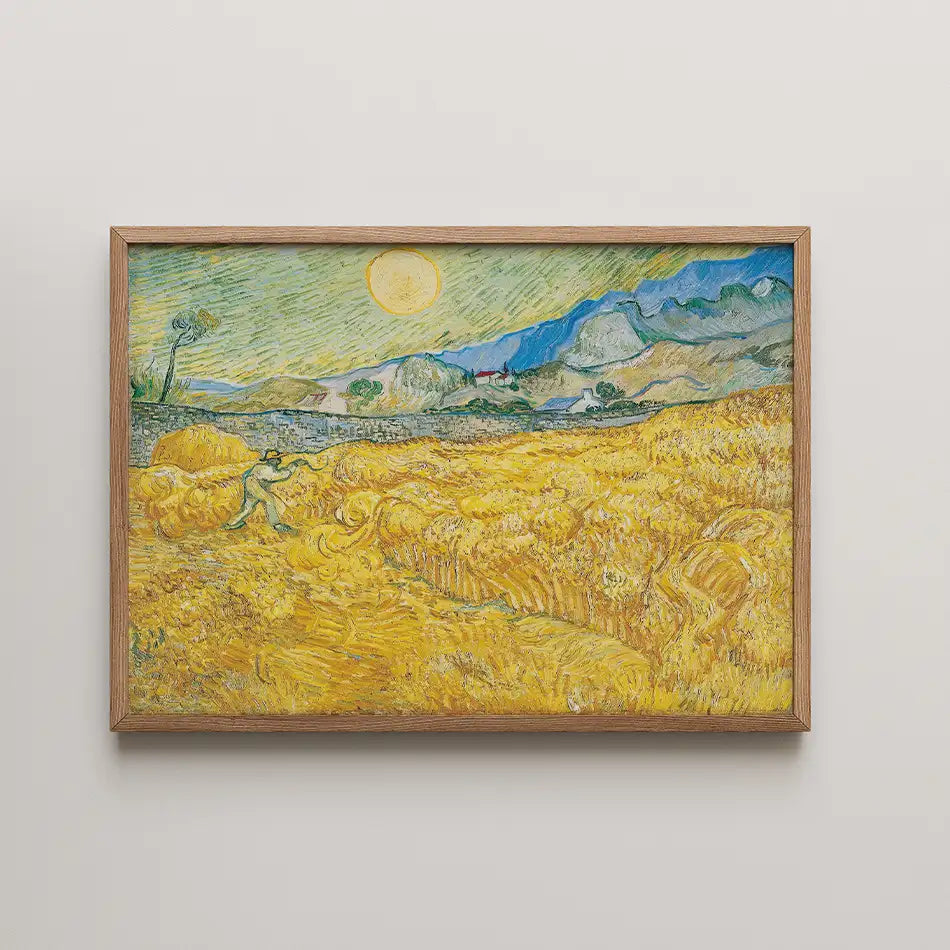 Framed painting of a vibrant yellow wheat field under a blue sky with a sun, featuring rolling hills and a distant farmhouse.