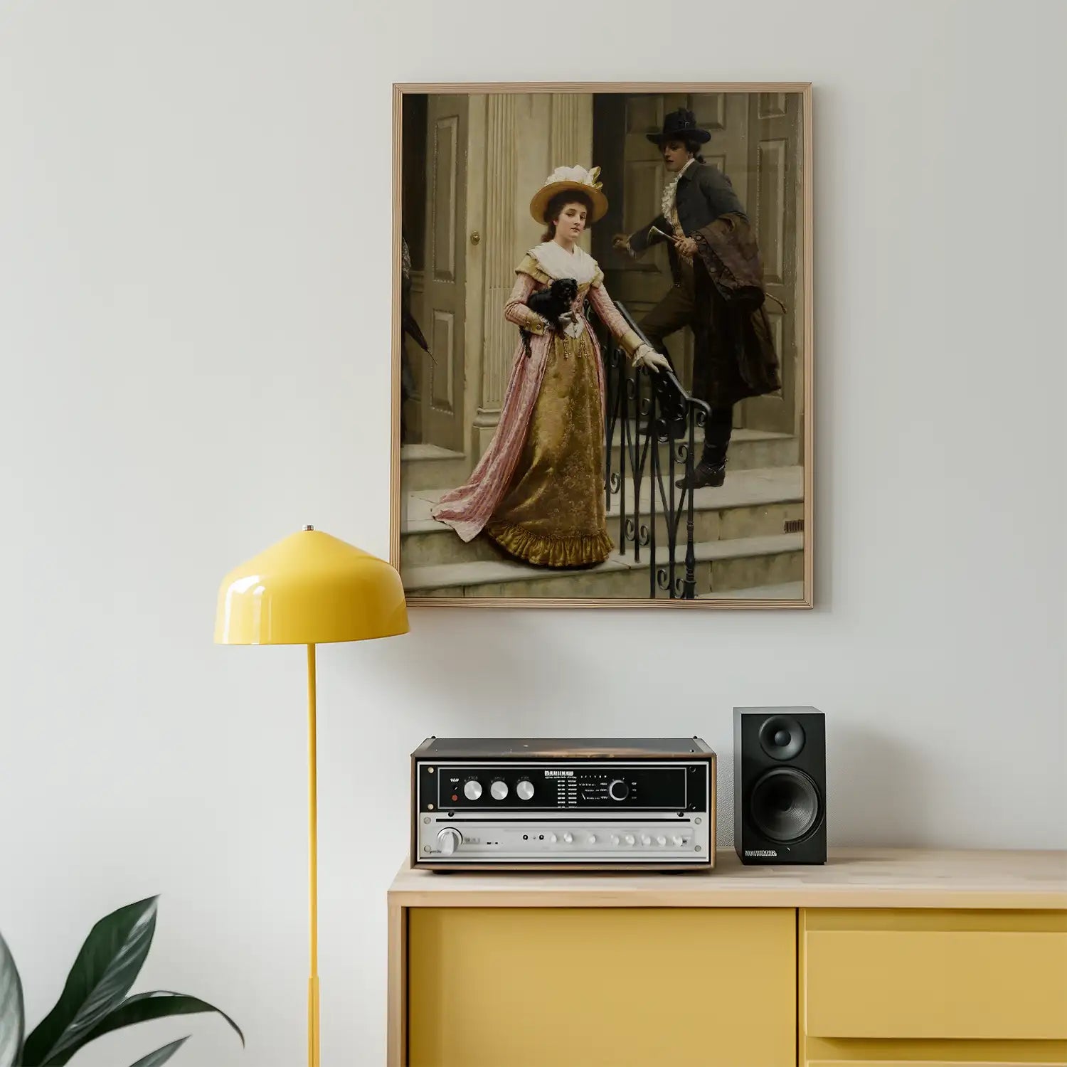 Vintage painting of a woman in a golden gown and hat, descending a staircase, framed and displayed on a wall above a yellow lamp and a turntable unit.