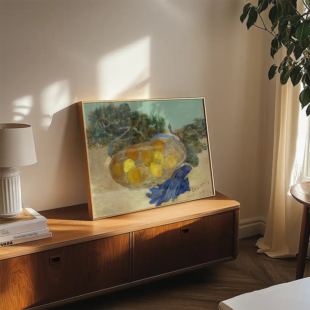 A colorful painting featuring a nest with yellow eggs, displayed in a well-lit living room setting on a wooden shelf beside a decorative table lamp.