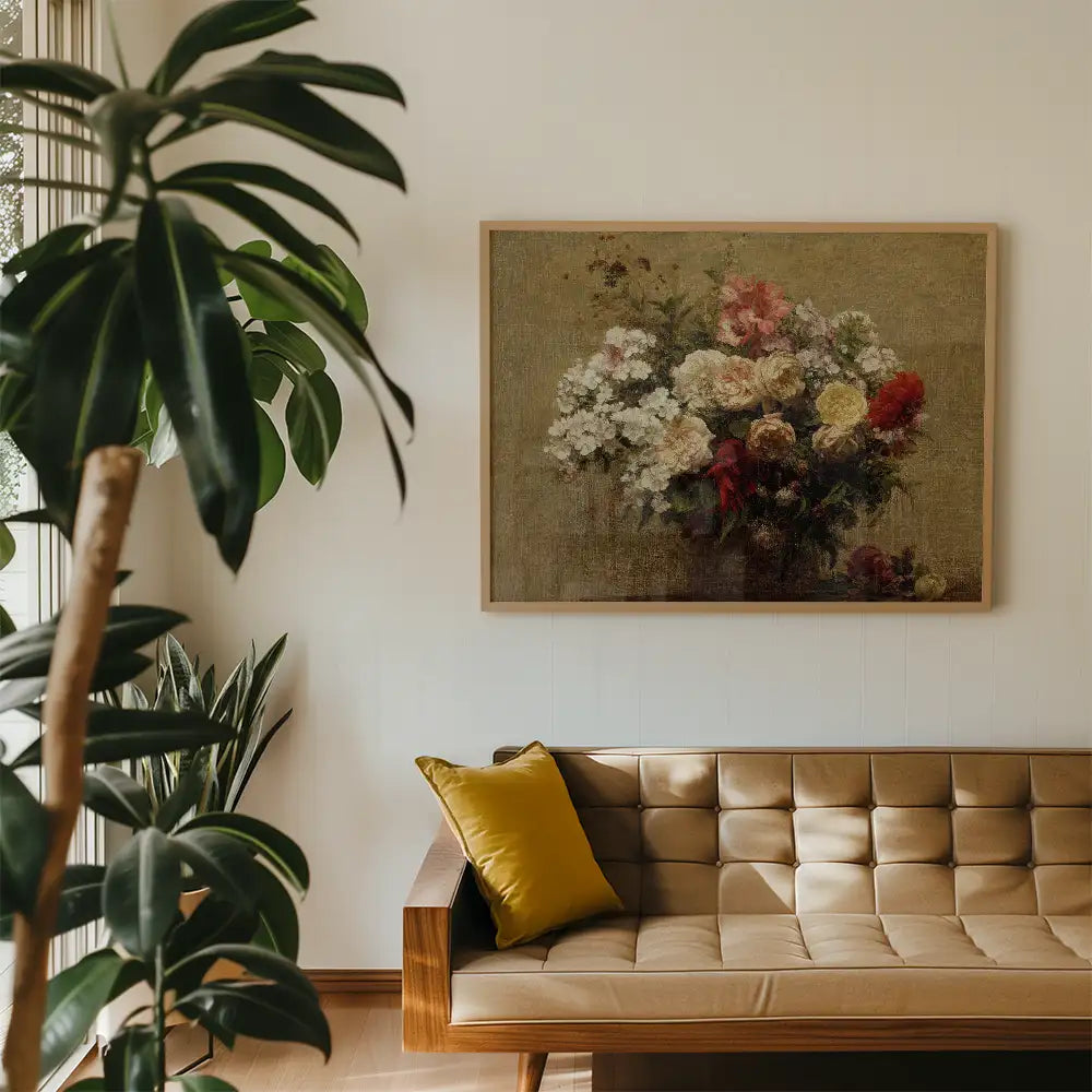 Painting of a colorful bouquet featuring various flowers in a wooden frame, displayed on a wall above a modern sofa in a cozy living room setting.