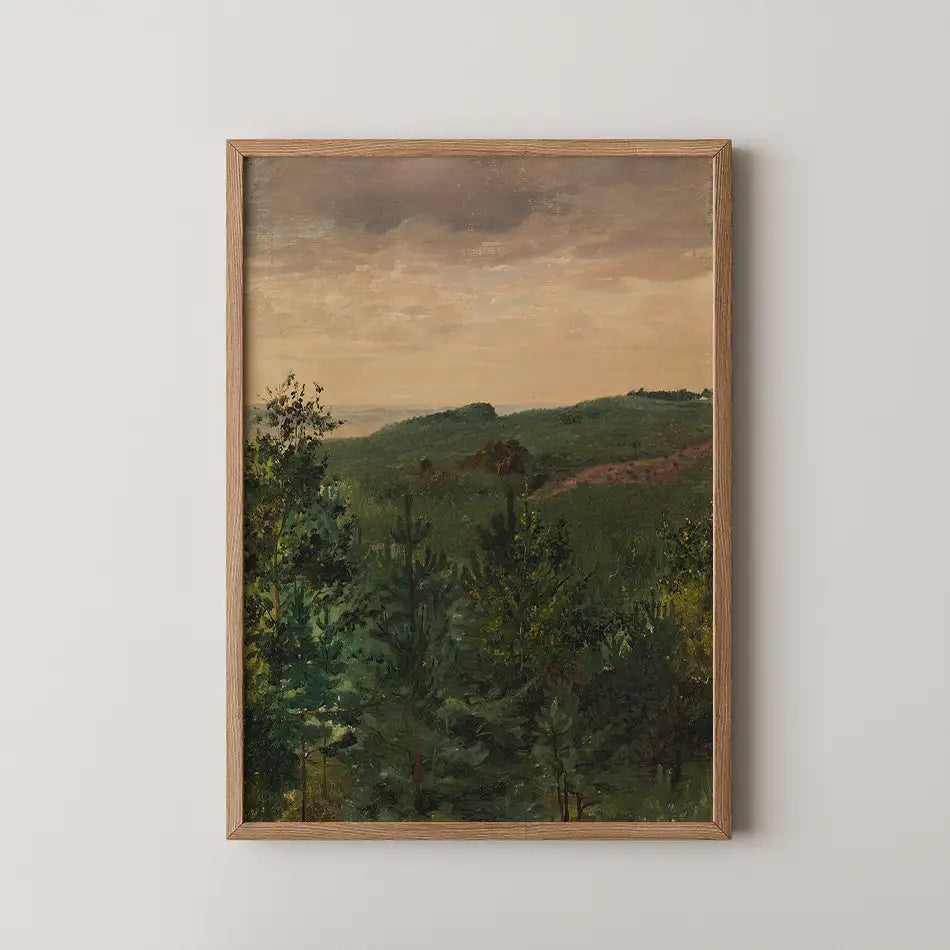 Framed painting of a green landscape with rolling hills and a cloudy sky.