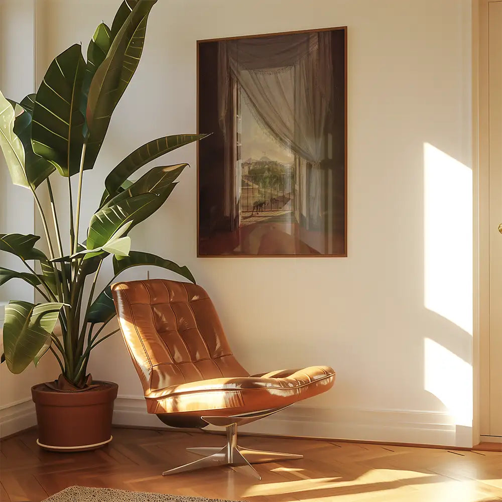 Interior setting featuring a brown leather chair beside a potted plant, with a framed painting of a scenic view on the wall.