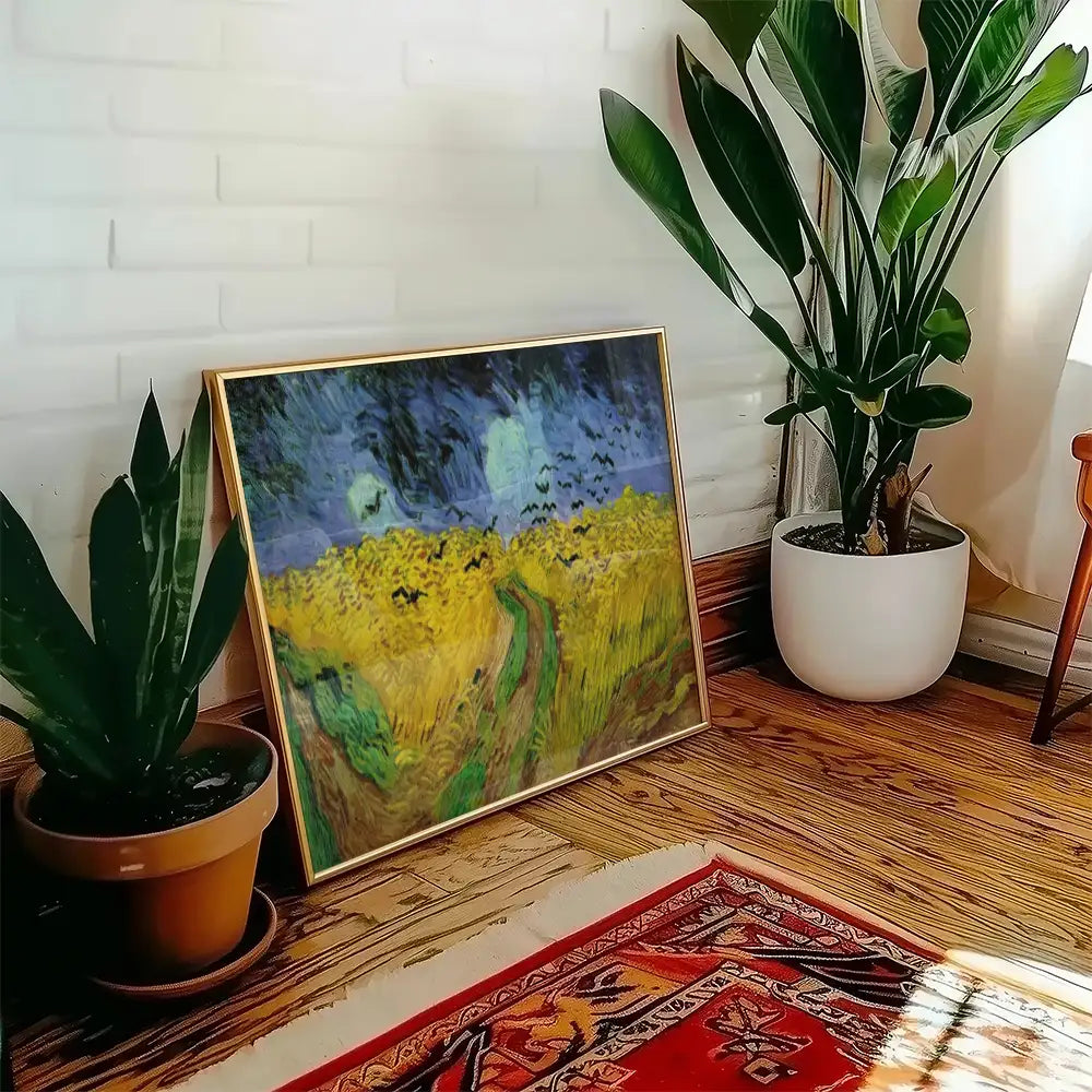 A vibrant painting featuring a landscape with yellow fields and a blue sky, displayed in a stylish frame in a cozy interior setting with plants and wooden flooring.