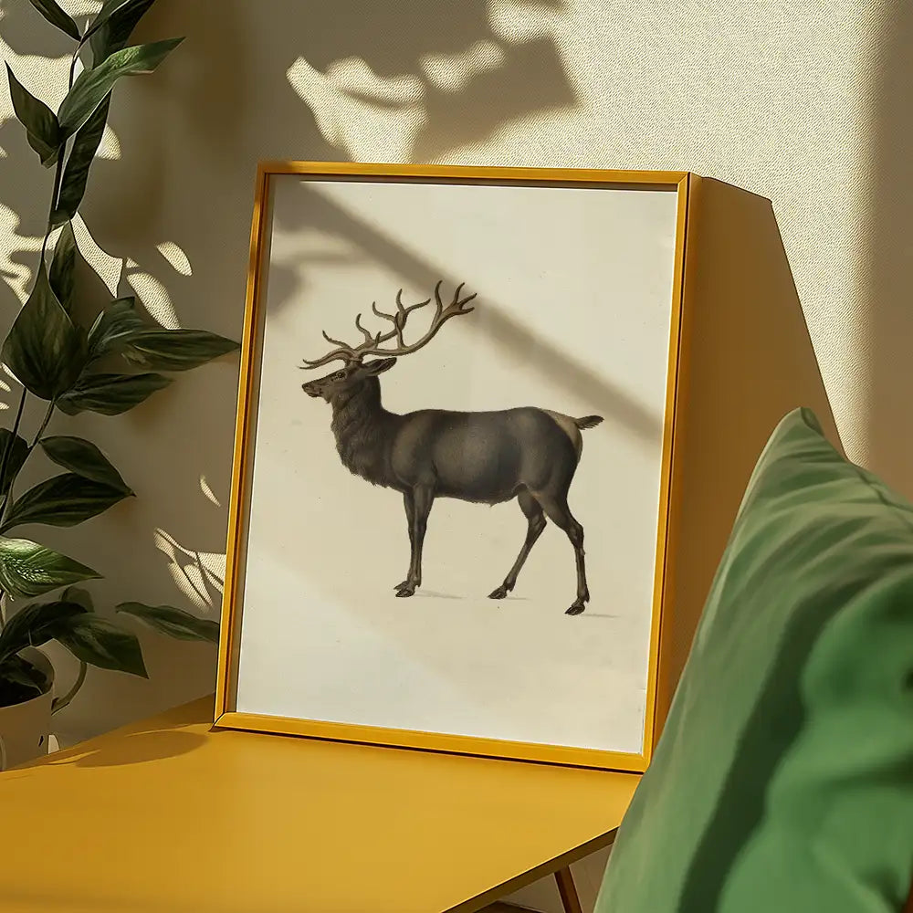 Framed painting of a majestic stag with antlers displayed on a yellow table next to a green sofa and plants.