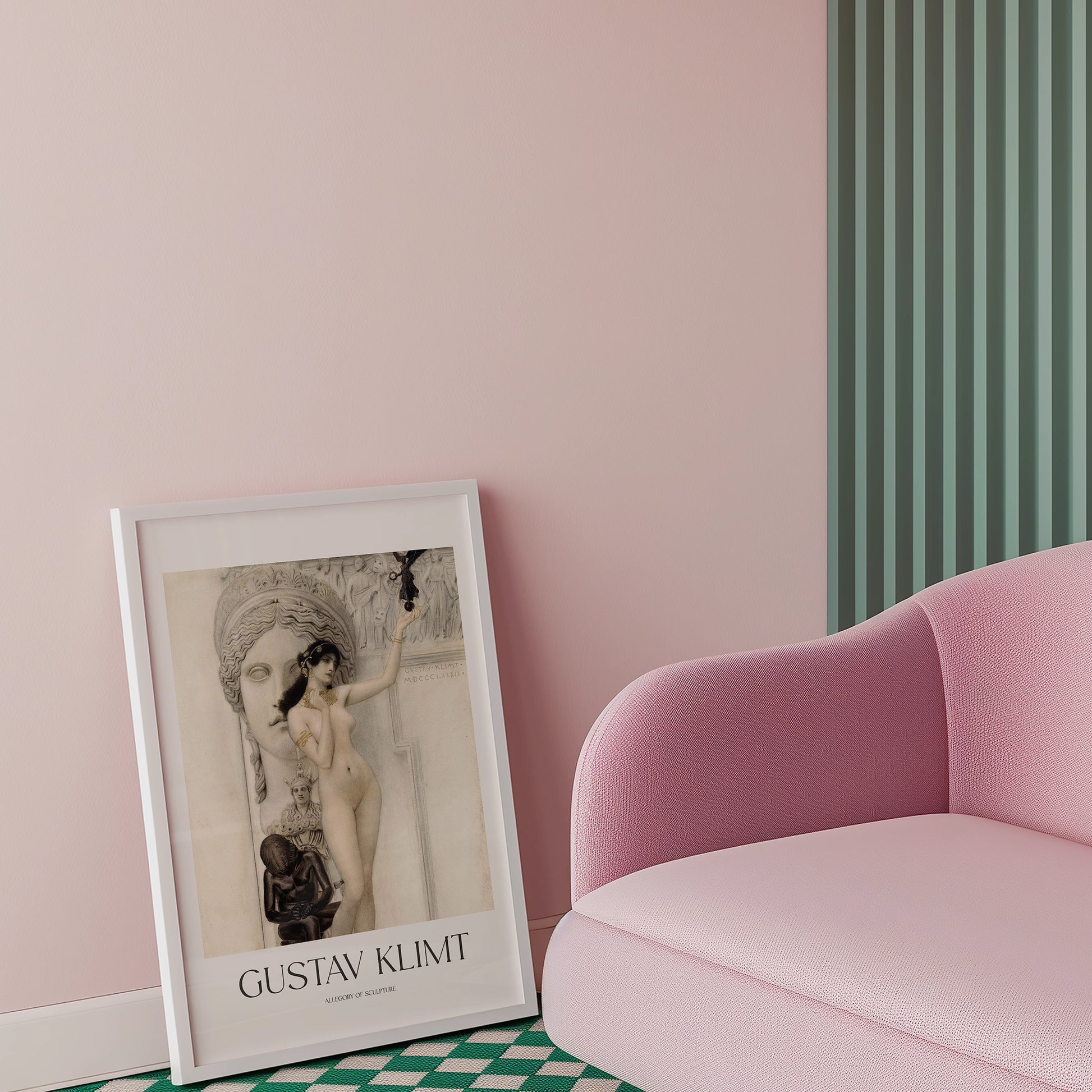 Framed Gustav Klimt art print on a pastel pink wall next to a pink sofa with green striped wallpaper in the background.