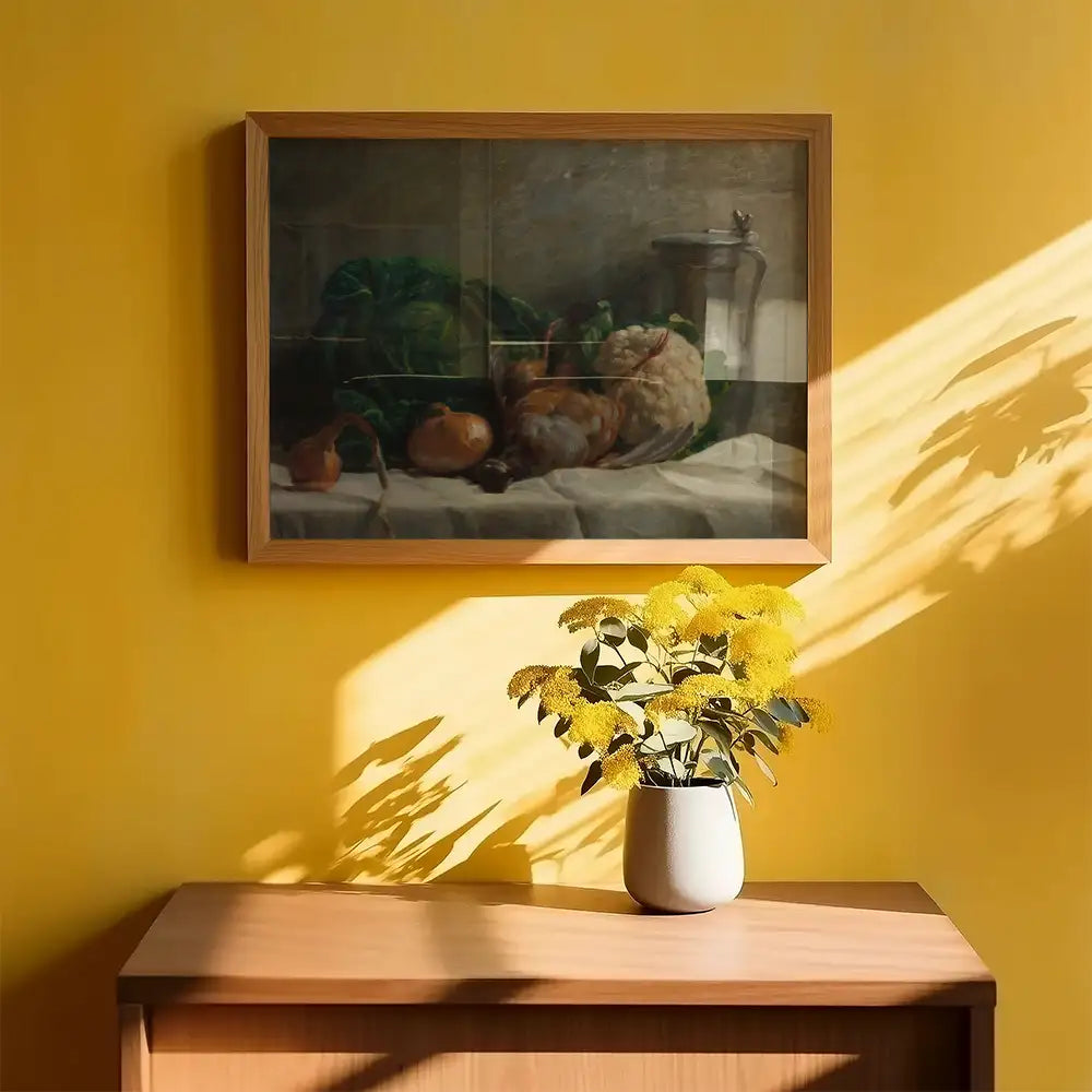 Still life painting featuring vegetables and a bowl displayed in a wooden frame against a yellow wall, with a vase of yellow flowers on a wooden surface below.