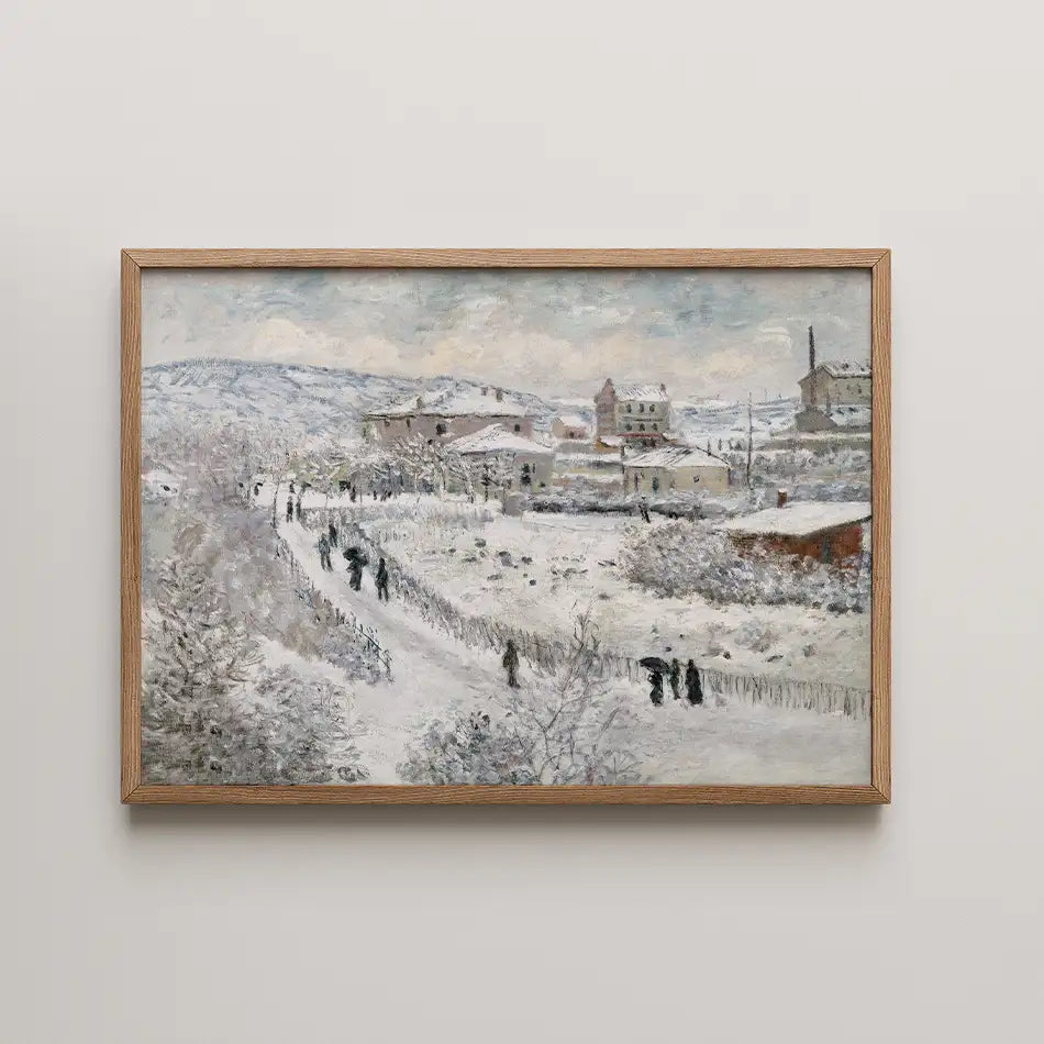 Painting of a snowy landscape with buildings and people walking along a path, framed in wood.