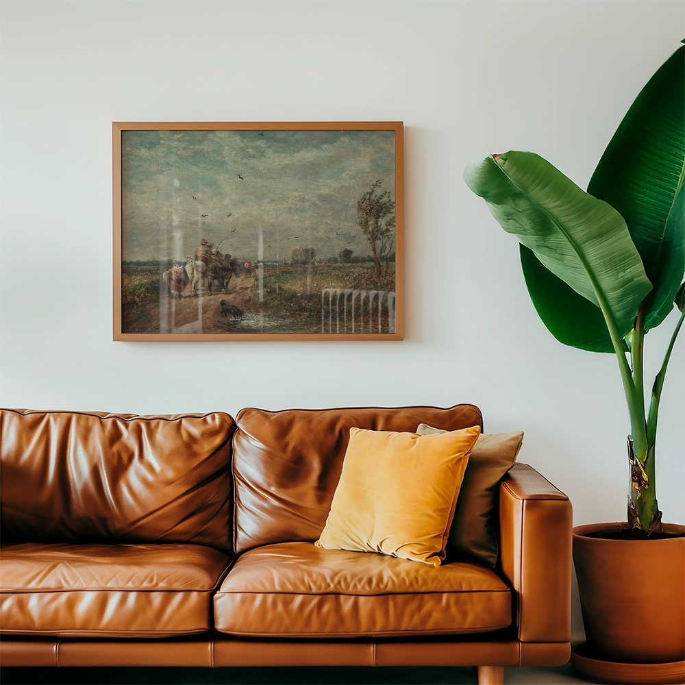 Framed painting of a pastoral scene depicting figures with horses, mounted above a brown leather sofa with decorative cushions and a large green plant.