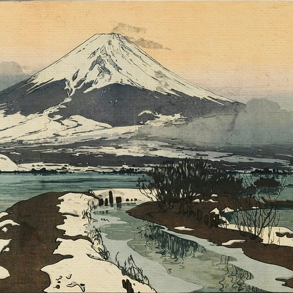 Painting of Mount Fuji with snow-capped peaks, a river and shoreline in the foreground, and a soft orange sky.