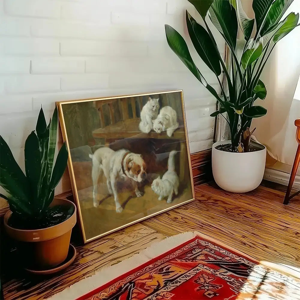 Framed painting of a dog interacting with three white cats, displayed near a green plant in a cozy indoor setting.