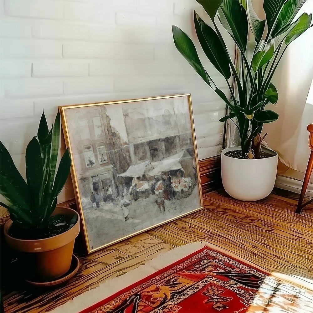 Painting of a bustling street market with people and vendors, framed and displayed on a wooden floor next to green plants and a decorative rug.