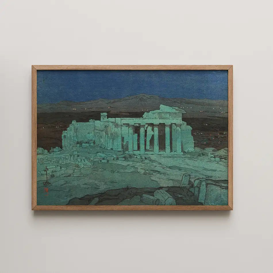 Painting of an ancient ruin illuminated against a dark blue sky, framed in natural wood.