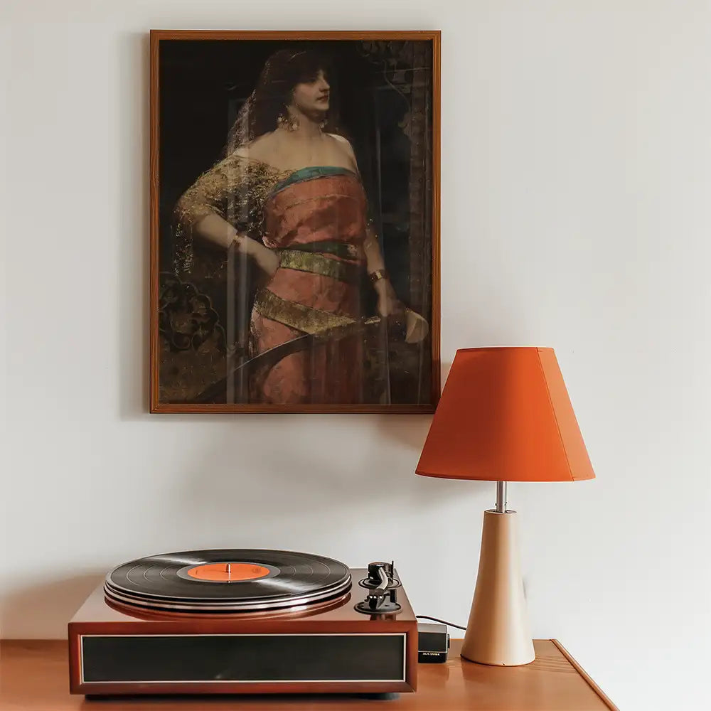 Vintage-style painting of a woman in a colorful dress hanging above a retro record player and a modern orange lampshade.