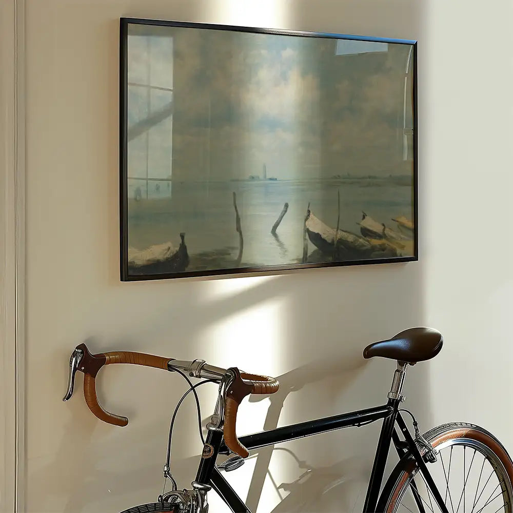 A serene painting of boats on a calm water surface, framed and hanging on a wall beside a vintage bicycle.