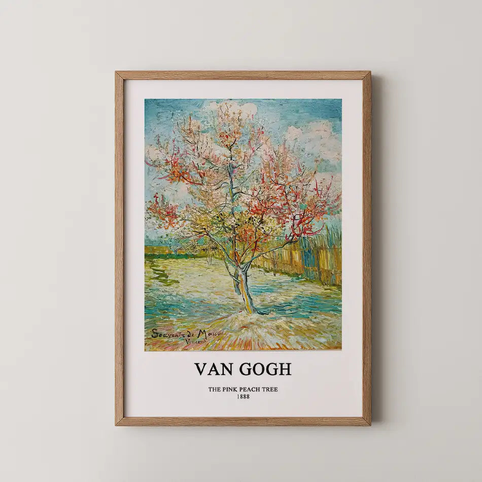 Framed painting of "The Pink Peach Tree" (1888) by Van Gogh, showcasing a blooming tree in vibrant colors against a serene landscape.