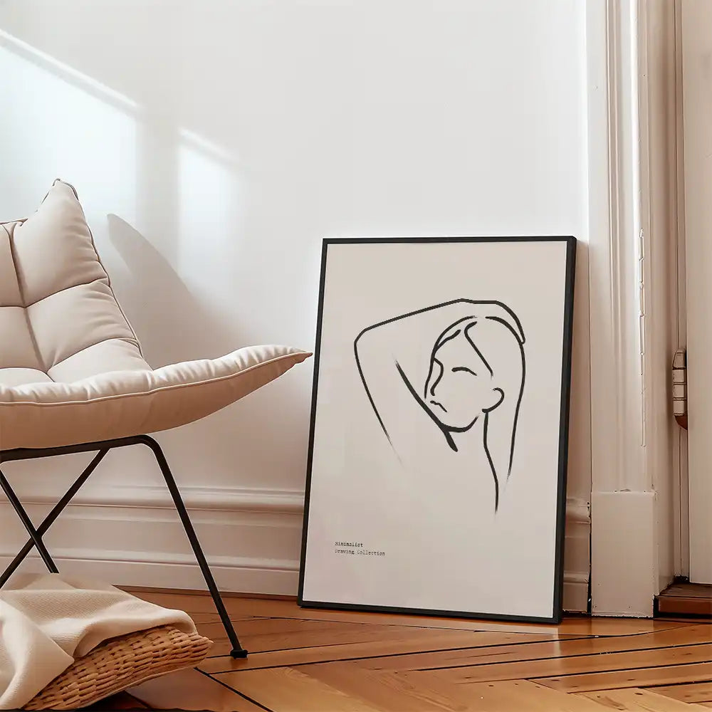 Modern line art poster of a woman with her arm raised, featuring minimalist design and framed, perfect for contemporary home decor.