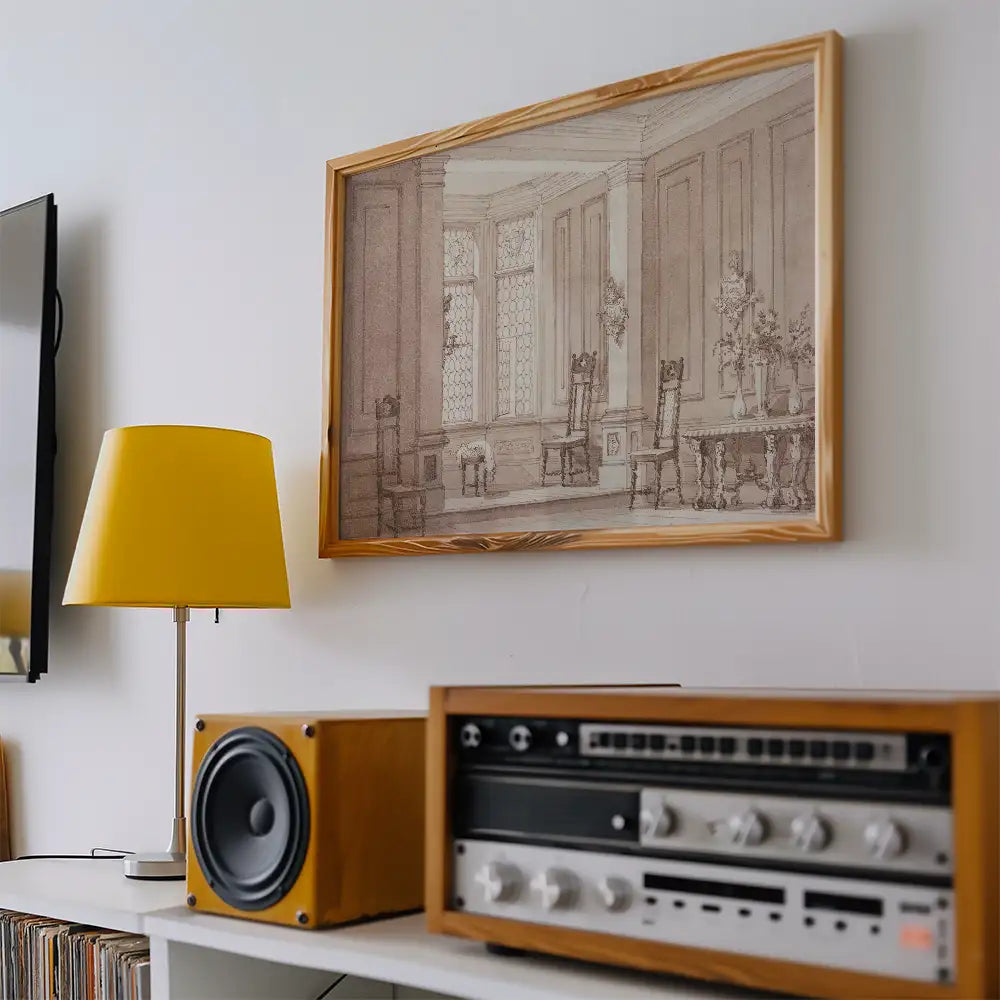 Framed artwork depicting an elegant interior with ornate chairs, displayed above a mid-century modern lamp and record player on a shelf.