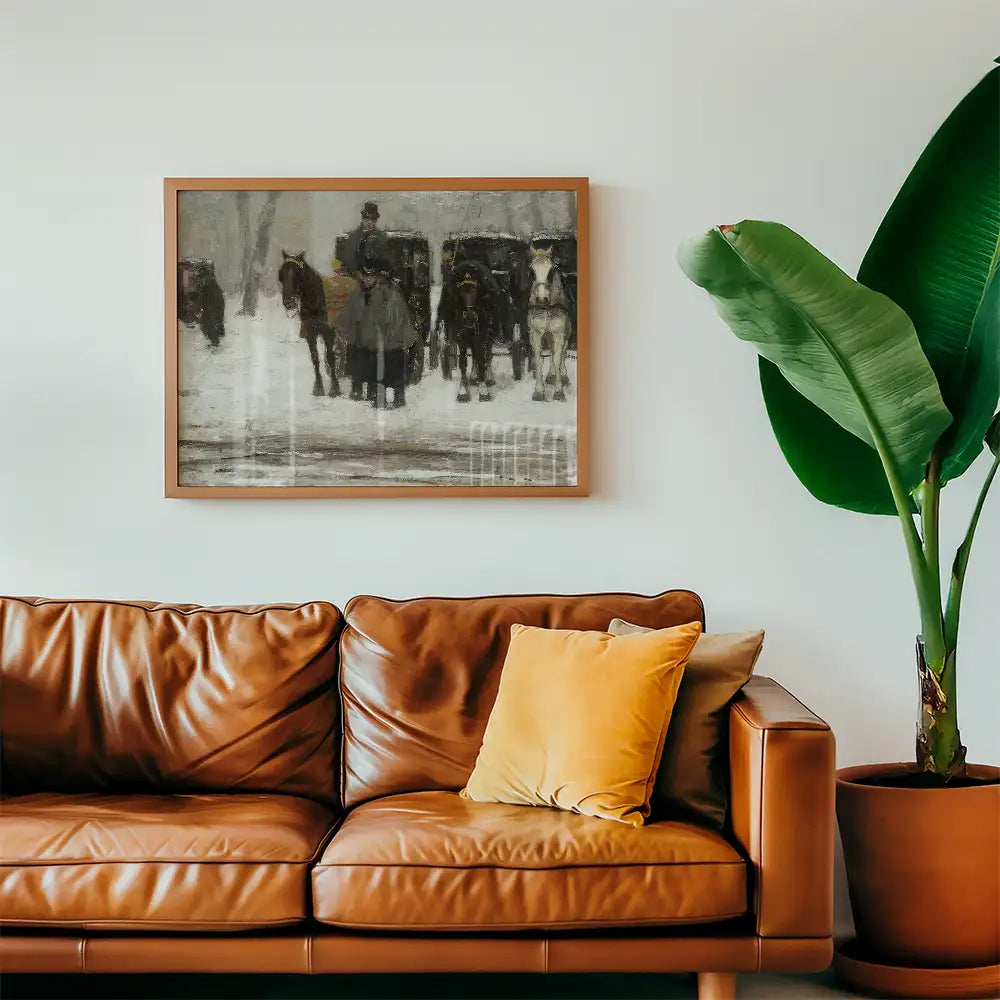 Framed painting of a winter scene featuring horse-drawn carriages and figures, displayed above a brown leather couch with decorative pillows and a large green plant.