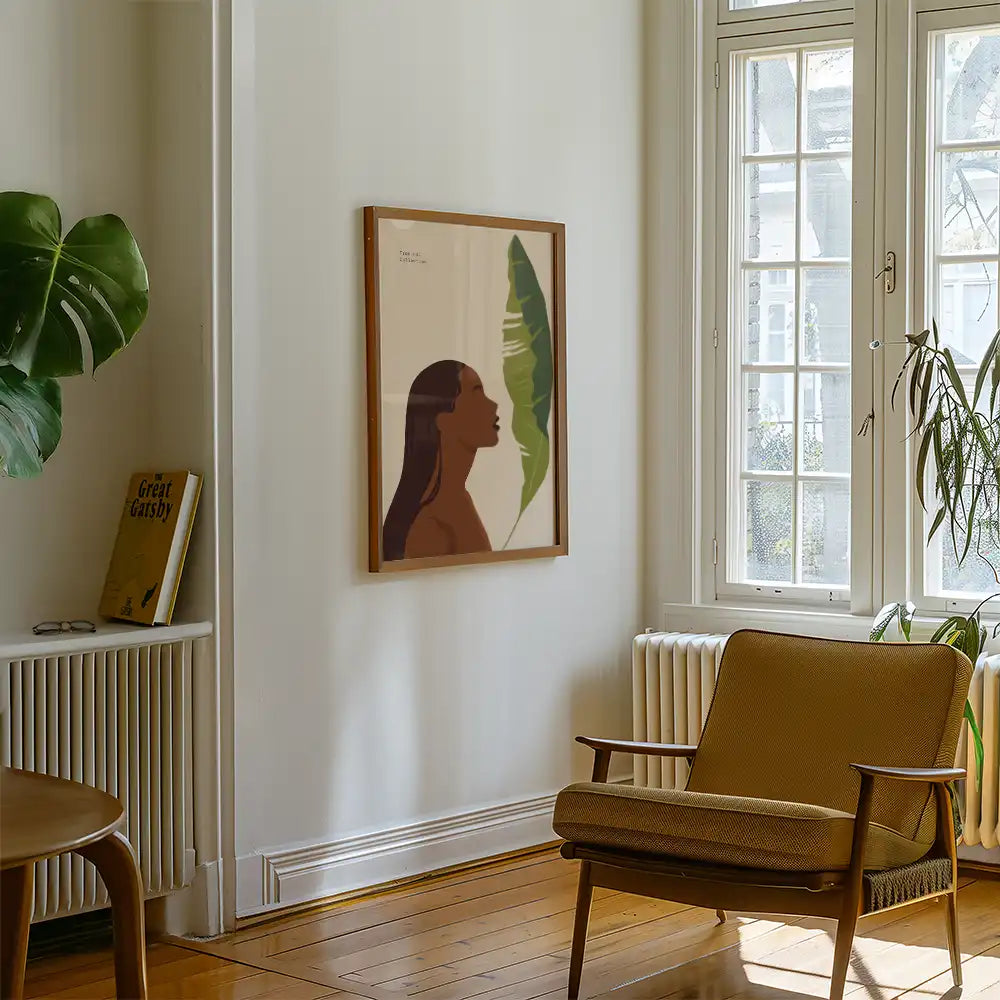 Modern art poster featuring a serene profile silhouette of a woman alongside a vibrant green leaf, perfect for home decor and interior styling.