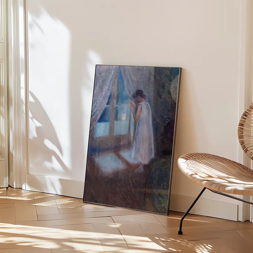 Painting of a figure in a white dress looking out a window, leaning against a wall with soft light filtering through curtains, displayed in a bright room with wooden flooring and a woven chair.