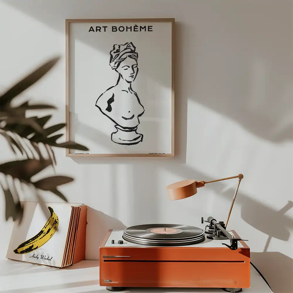 Modern reprint of a famous painting featuring a bust sculpture with the text "ART BOHÈME," displayed above a vintage record player and vinyl records.