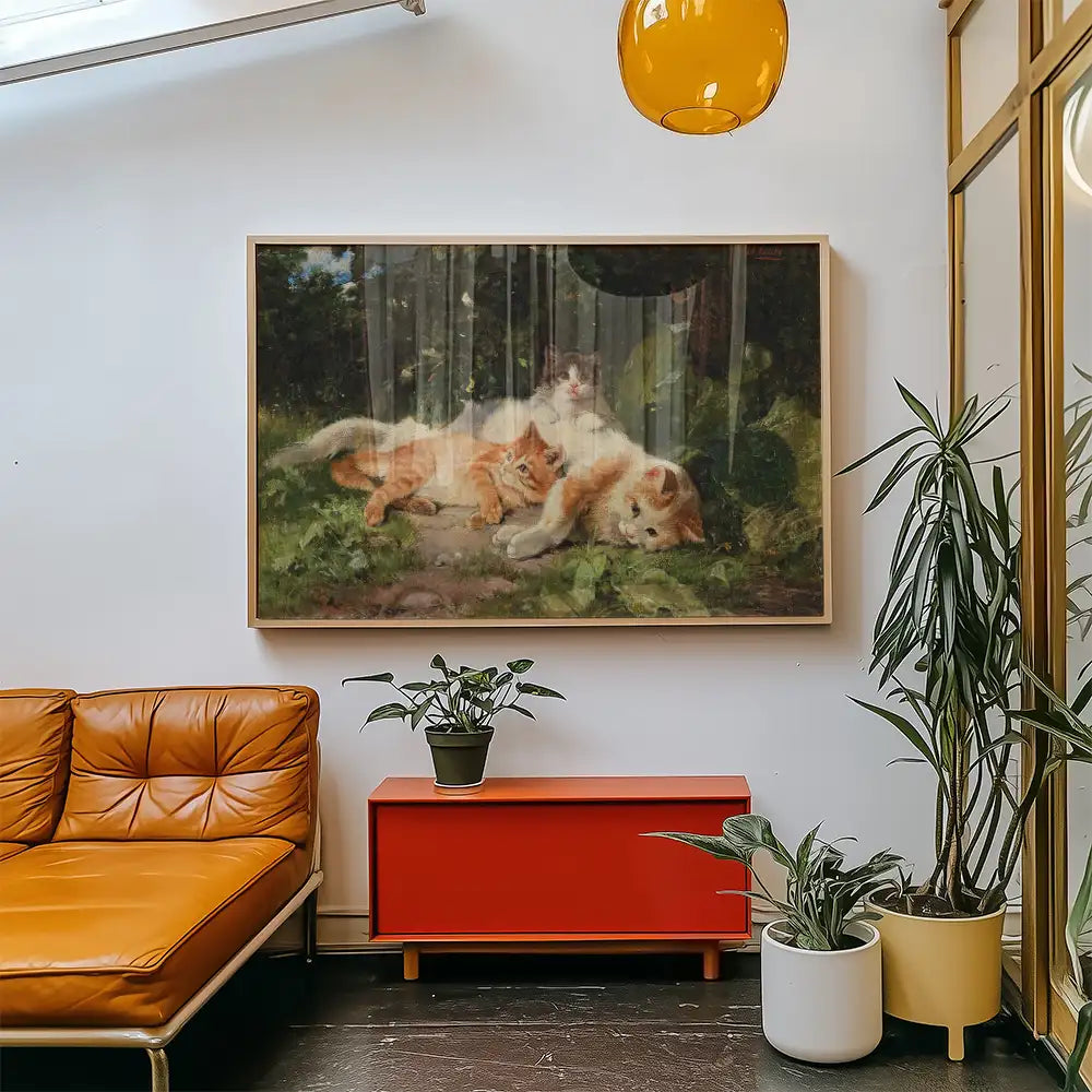 Painting of a sleeping dog and two cats surrounded by greenery, displayed in a modern living room with an orange couch and plants.