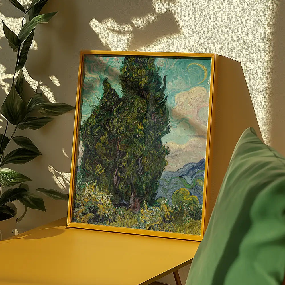 Framed painting of a large cypress tree against a colorful sky, displayed on a yellow table with green decor and plants in the background.