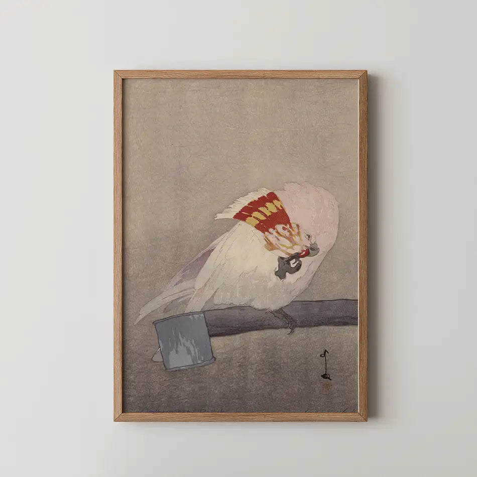Framed painting of a bird with a colorful headdress perched on a branch beside a small blue pot.