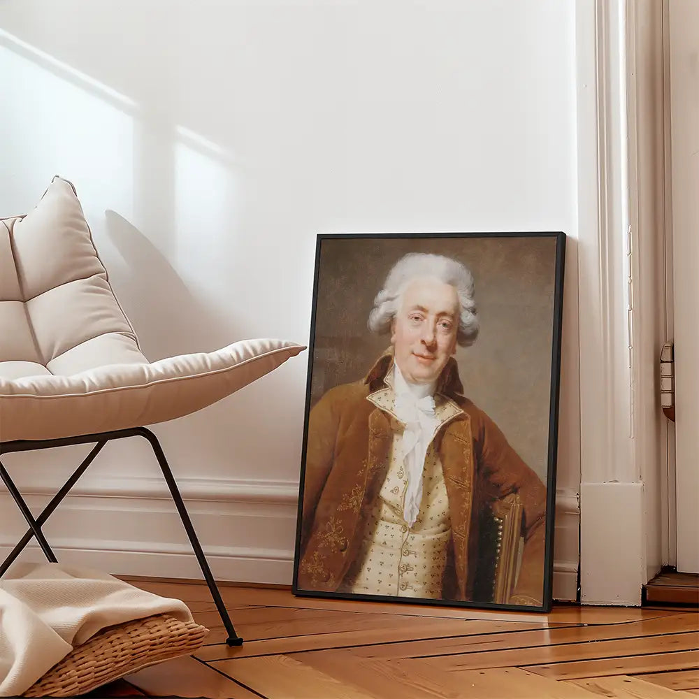 Framed portrait painting of a gentleman in historical attire, leaning against a wall next to a modern chair in a bright room.