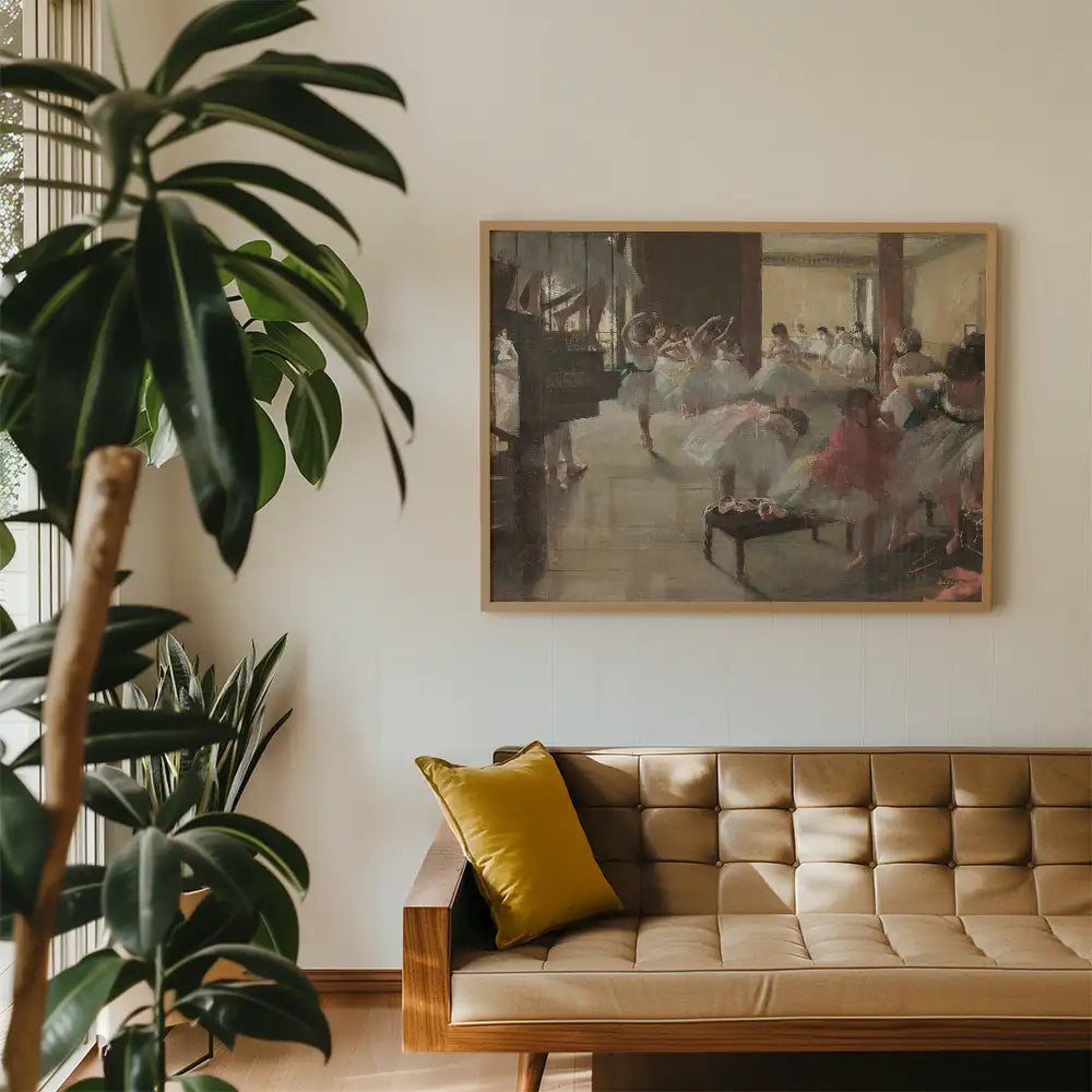 Painting of ballerinas in a studio, framed and displayed above a modern couch with a yellow pillow, surrounded by indoor plants.