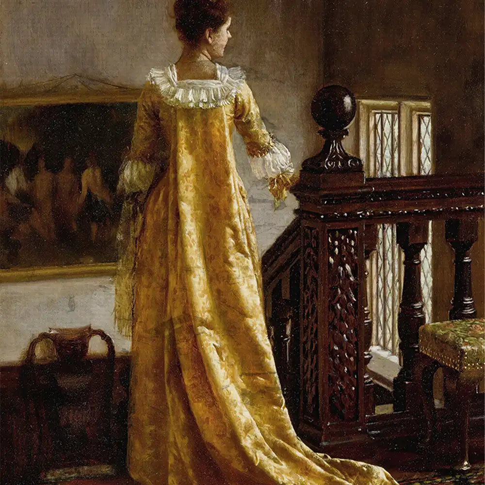 Woman in a yellow gown standing on a staircase with ornate wooden railings and a painting in the background.