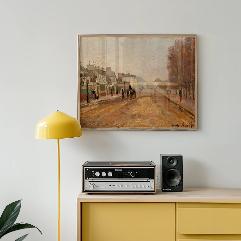 Framed impressionist painting on wall above a vintage audio setup with a yellow lamp and modern speakers in a stylish interior setting.
