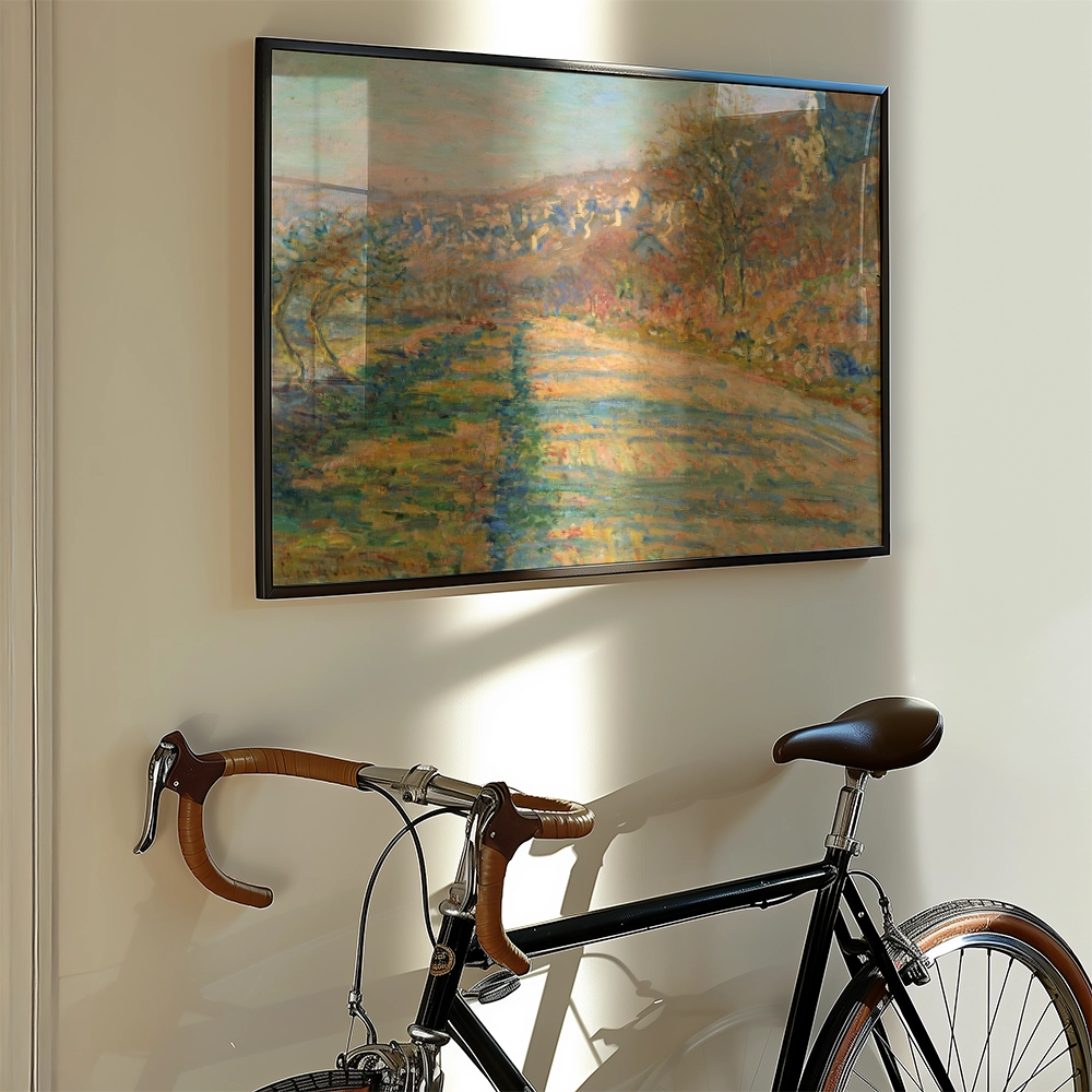 A vibrant landscape painting framed and displayed on a wall, with a stylish bicycle leaning against it.