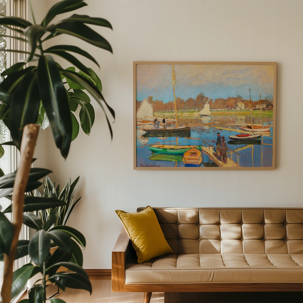Painting of a serene harbor scene with boats and water under a blue sky, framed and displayed above a modern tan sofa with a yellow cushion, complemented by indoor plants.