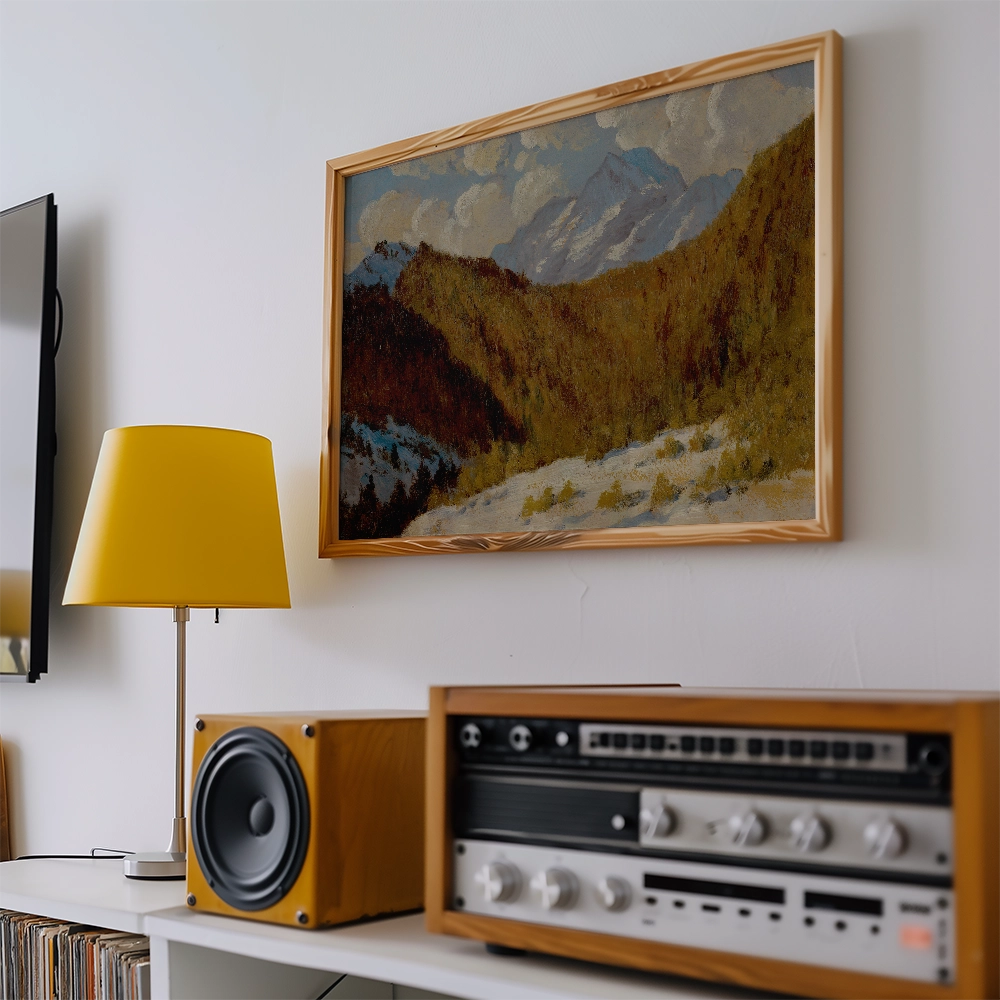 Painting of a mountainous landscape in a wooden frame, displayed above a yellow lamp and vintage audio equipment on a white shelf.