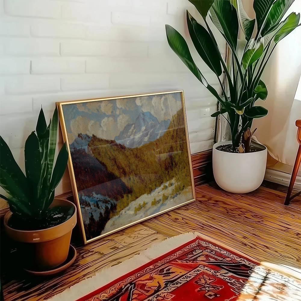 A beautifully framed mountain landscape painting displayed in a modern living room setting with indoor plants and a decorative rug.