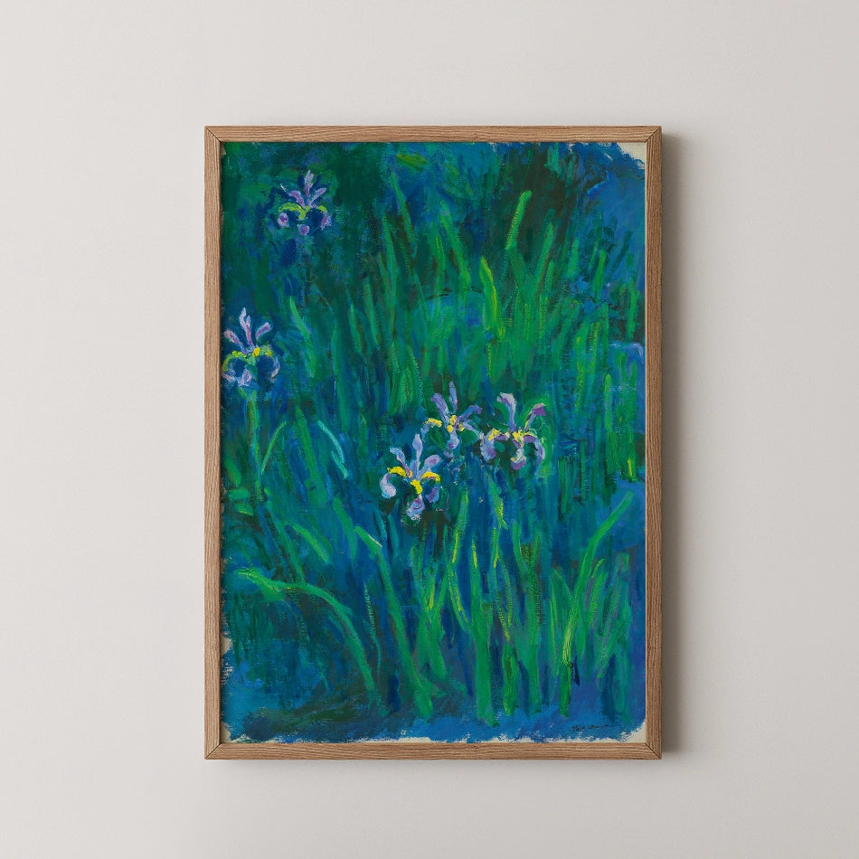 A vibrant painting of irises in a green field, framed in light wood.