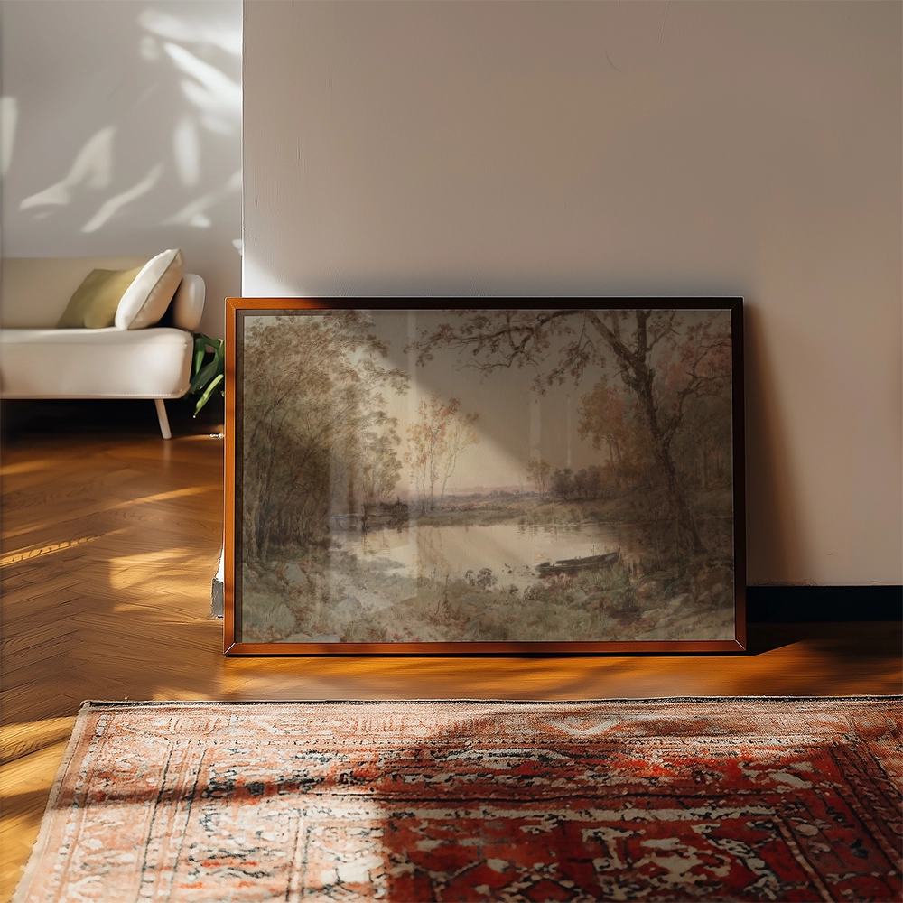 Framed painting of a serene landscape with trees and a calm river, displayed in a bright interior setting.
